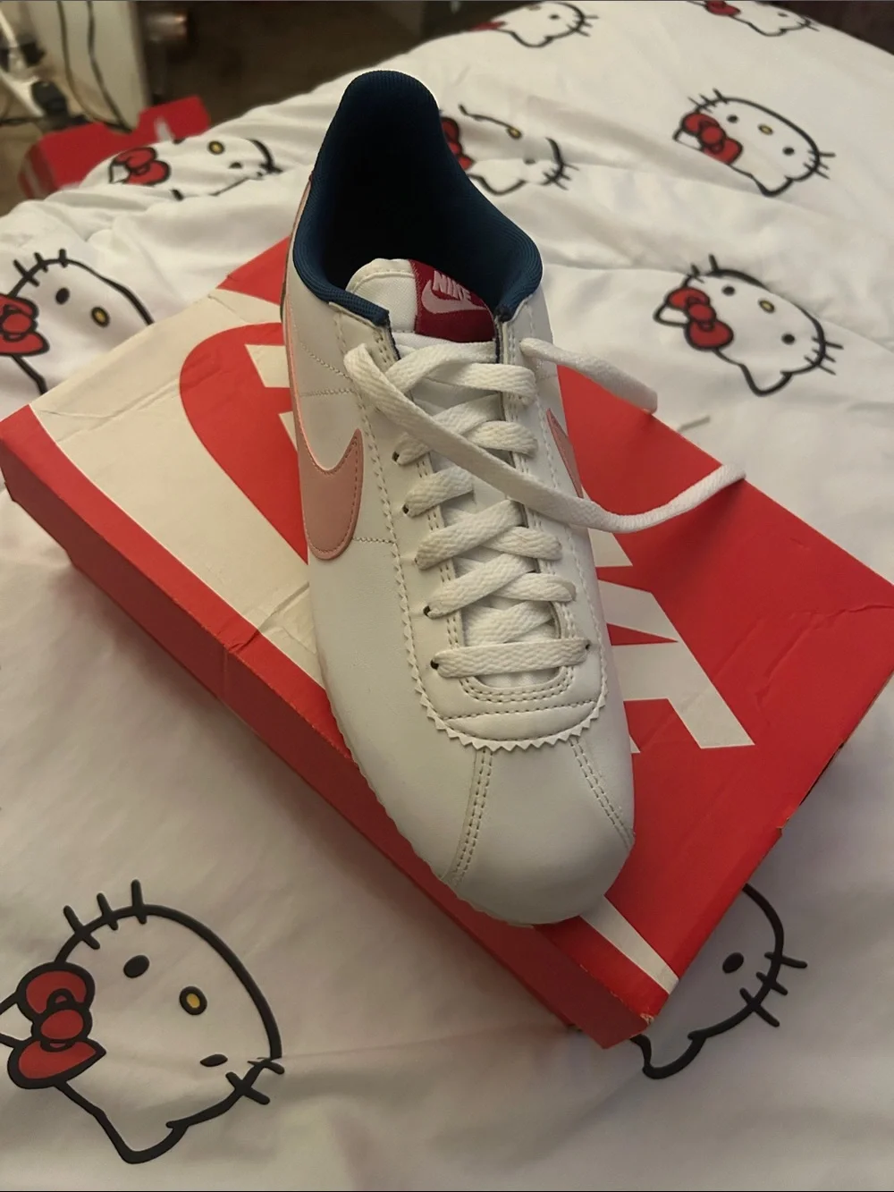 Nike White Sneakers with Pink Swoosh and Yellow Midsole